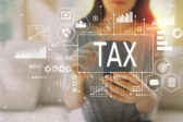 Tax with woman using a smartphone